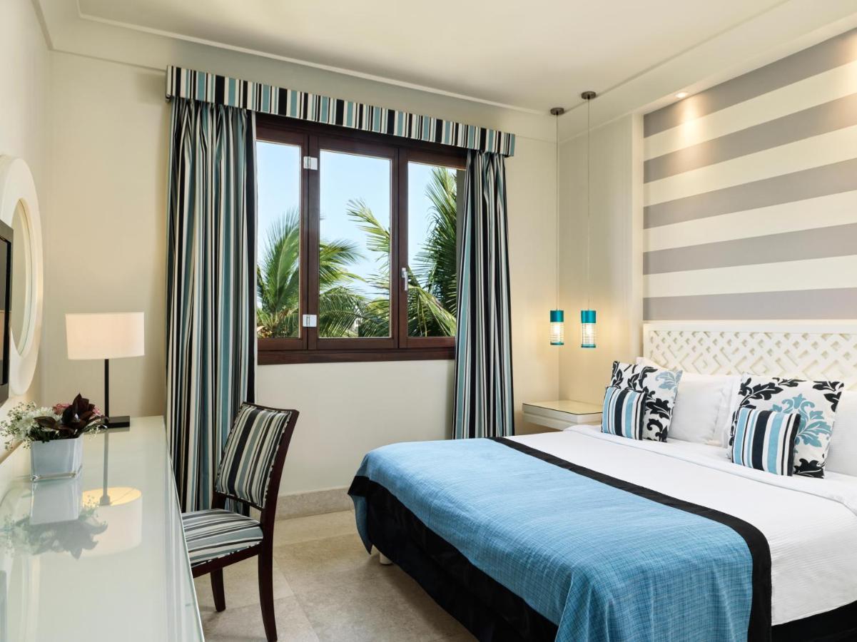 Fanar Hotel & Residences Salalah Exterior photo A bedroom at the resort