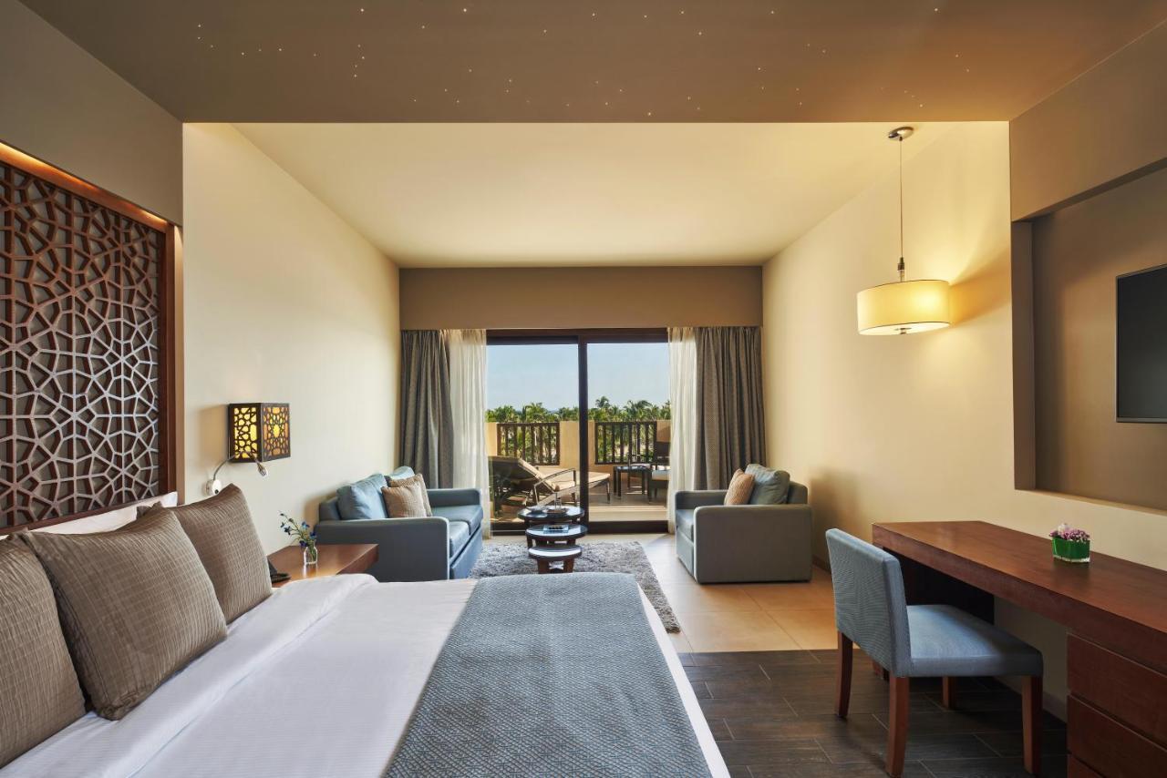 Fanar Hotel & Residences Salalah Exterior photo A room at the hotel
