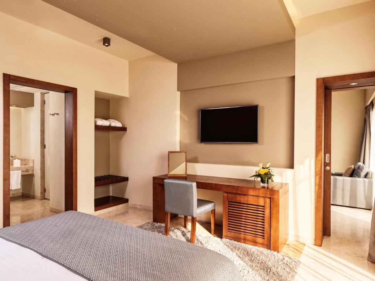 Fanar Hotel & Residences Salalah Exterior photo A room at the hotel
