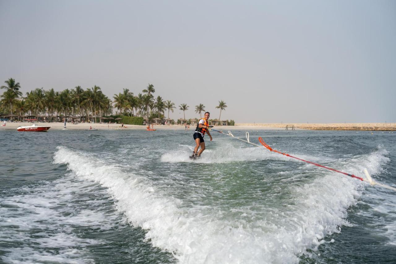 Fanar Hotel & Residences Salalah Exterior photo A water skier in Dubai