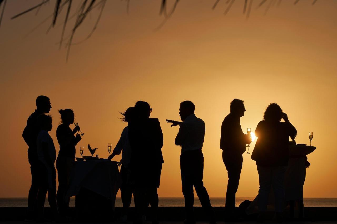 Fanar Hotel & Residences Salalah Exterior photo Sunset at the beach